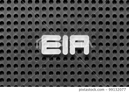 White alphabet letter in word EIA (abbreviation of Environmental Impact Assessment) on black pegboard background White alphabet letter in word EIA (abbreviation of Environmental Impact Assessment) on black pegboard background 99132077