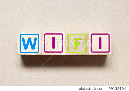 Color letter block in word wifi on wood background Color letter block in word wifi on wood background 99132104