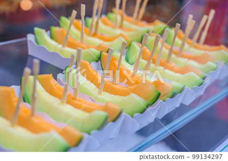 Sliced Japanese Melon for sale in street food market Sliced Japanese Melon for sale in street food market 99134297