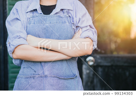 closeup people arm crossed for home business management. woman arm folded confident manager concept closeup people arm crossed for home business management. woman arm folded confident manager concept 99134303