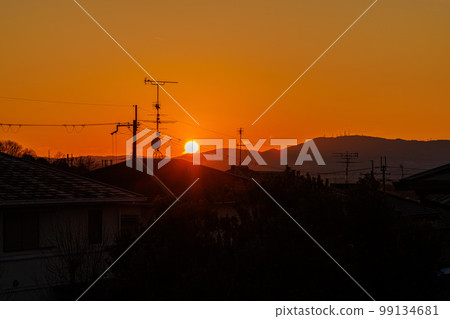 Sunset at Children's Park in Nara City Residential Area Sunset over Mt. Ikoma seen through the roofs of private houses 99134681