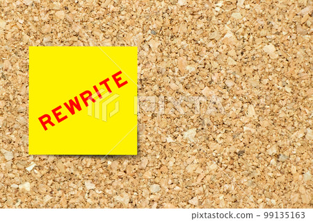 Yellow note paper with word rewrite on cork board background with copy space Yellow note paper with word rewrite on cork board background with copy space 99135163