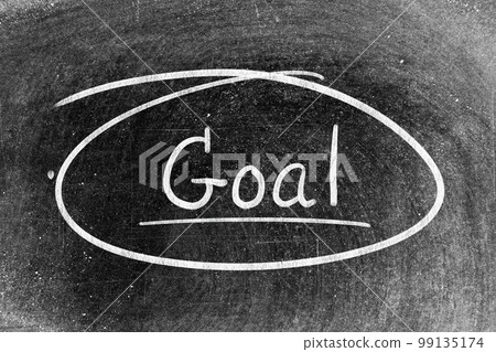 White chalk hand writing in word goal and circle shape on blackboard background 99135174