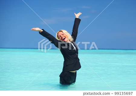 business woman in ocean 99135697