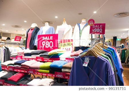 Fashionable clothing store in a shopping center Fashionable clothing store in a shopping center 99135731