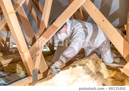 thermal insulation of roof spaces with glass wool 99135892