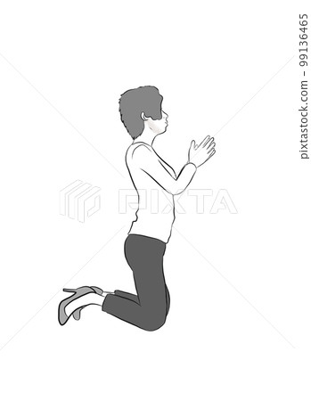 Young woman sincerely praying on her knees  99136465