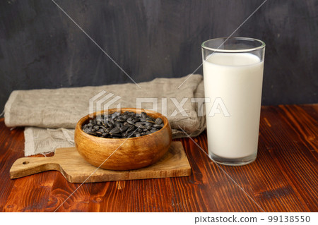 New types of vegetable milk, milk from seeds, from sunflower. Selective focus 99138550