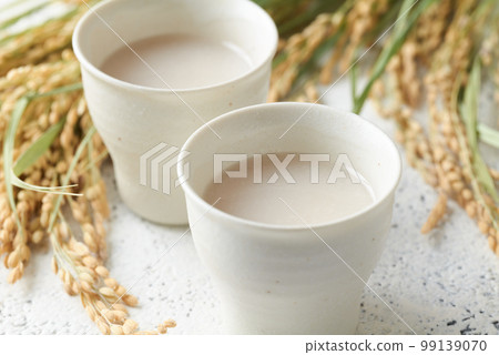 Amazake poured into a cup Amazake poured into a cup 99139070