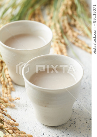 Amazake poured into a cup Amazake poured into a cup 99139071