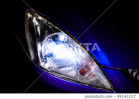 car headlight headlight of modern prestigious car close up. 99141237