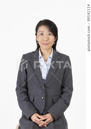 ID photo of a middle-aged woman ID photo of a middle-aged woman 99142114