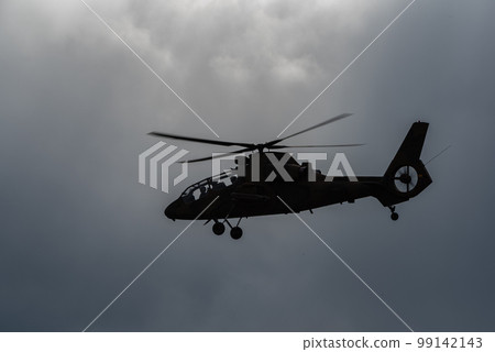 military helicopter in flight military helicopter in flight 99142143