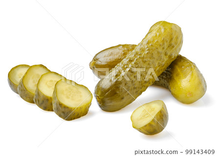 Pickled cucumbers whole and sliced isolated on white 99143409