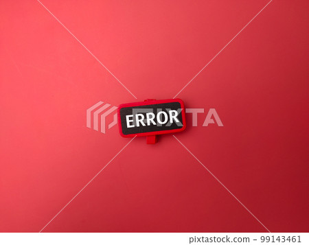 Top view red wooden board with the word ERROR on a red background. 99143461