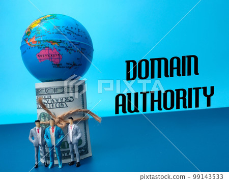 Earth globe,banknotes and miniature people with text DOMAIN AUTHORITY on a blue background Earth globe,banknotes and miniature people with text DOMAIN AUTHORITY on a blue background 99143533