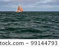 Sailboat on blue open sea with clouds on sky. Concept of travel, adventure and vacation. 99144793