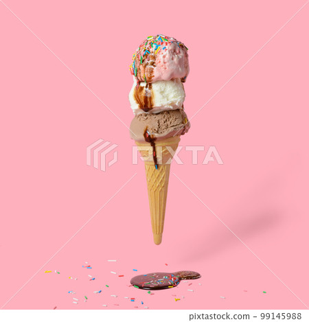 concept of flying wafer cone with ice cream 99145988