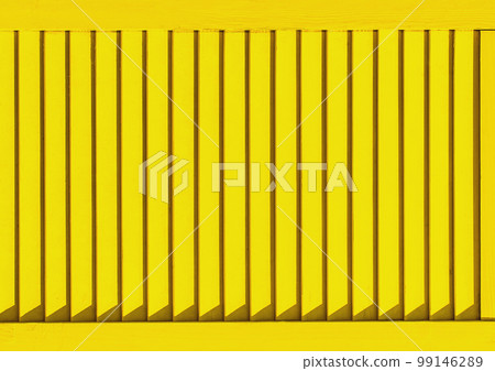 Part of modern interior with yellow horizontal patterned texture of wooden shutters, casements or blinds background Part of modern interior with yellow horizontal patterned texture of wooden shutters, casements or blinds background 99146289