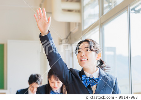 High school students wearing uniforms studying in the classroom 99147968