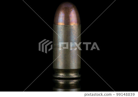 45 caliber round isolated on black with reflexion. 45 caliber round isolated on black with reflexion. 99148839