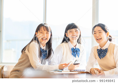 High school girl smartphone classroom High school girl smartphone classroom 99149841