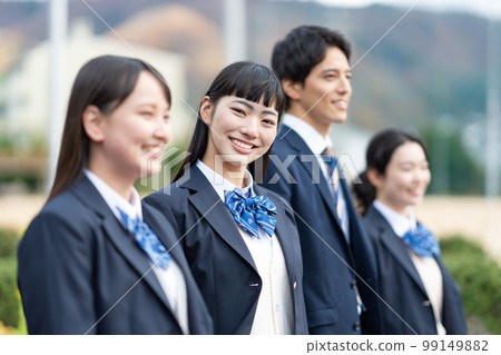 High school girls and boys lined up in the schoolyard 99149882
