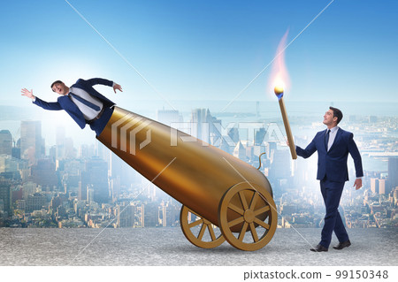 Concept of lay-off with businessman and cannon Concept of lay-off with businessman and cannon 99150348