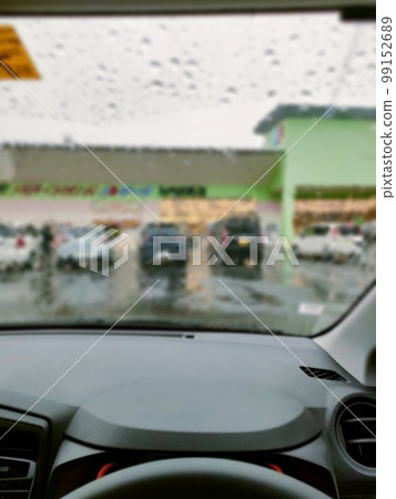 driver's seat in the rain 99152689