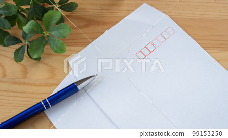 white envelope and pen white envelope and pen 99153250