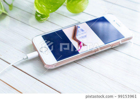 Charging smartphone 99153961