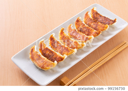 eat fried dumplings 99156730