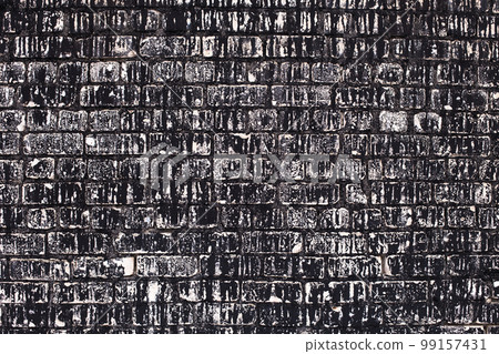 Old brick black color wall background. Dark stone texture 99157431