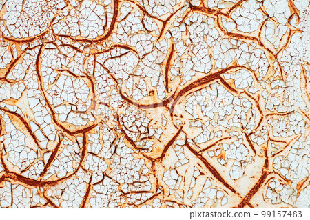 Rusty metal abstract background. Texture of an old grunge metal plate with cracked paint. Rusty metal abstract background. Texture of an old grunge metal plate with cracked paint. 99157483