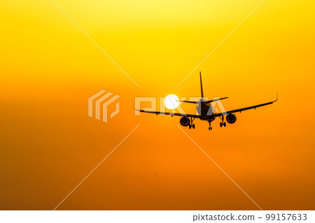 Airplane and sunset at Saga Airport 99157633