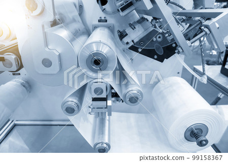 The roll of plastic bag in extrusion machine. 99158367