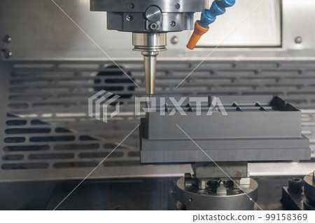 The CNC milling machine finish cutting the graphite electrode parts with solid ball end mill. 99158369