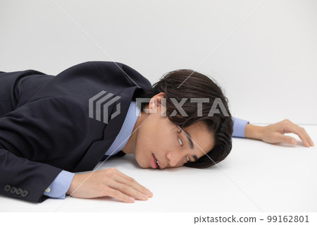 Fatigue anemia collapsing businessman Fatigue anemia collapsing businessman 99162801