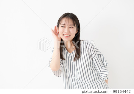 Female white background listening ears Female white background listening ears 99164442