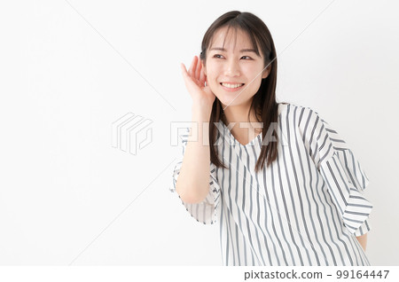 Female white background listening ears 99164447