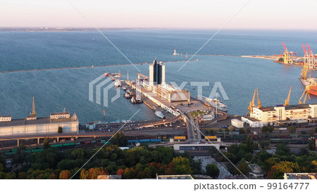Aerial drone view of Odessa sea port infrastructure. Cruise and cargo ships. Aerial drone view of Odessa sea port infrastructure. Cruise and cargo ships. 99164777