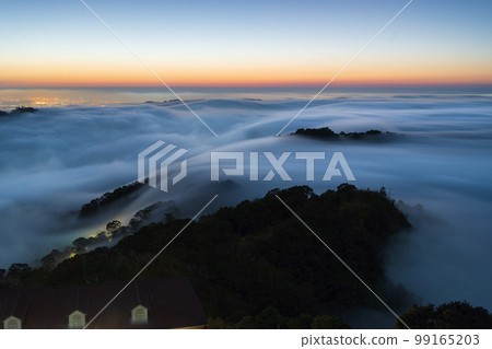 Layers of surging clouds are very spectacular. Sunset behind the mountains. Layers of surging clouds are very spectacular. Sunset behind the mountains. 99165203