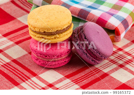 Colorful macaroon on tablecloth 99165372