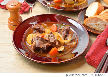 Beef shank beef stew, beef shank stew, western stew. Dinner dish, for two. Serve with baguette. Beef shank beef stew, beef shank stew, western stew. Dinner dish, for two. Serve with baguette. 99166556