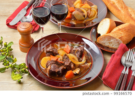 Beef shank beef stew, beef shank stew, western stew. Dinner dish, for two. Serve with baguette. Beef shank beef stew, beef shank stew, western stew. Dinner dish, for two. Serve with baguette. 99166570