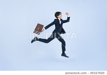 young businessman jumping 99167600