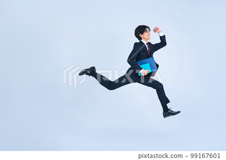 Young businessman jumping (Cutout PNG also available! See author profile) Young businessman jumping (Cutout PNG also available! See author profile) 99167601