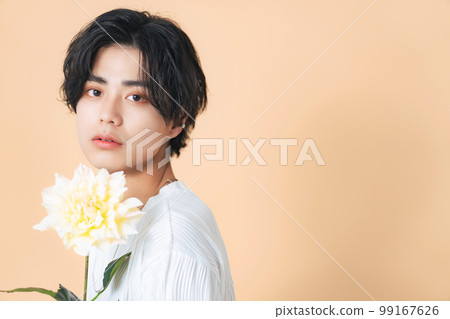Man with flowers, genderless makeup, men's cosmetics, skin care 99167626