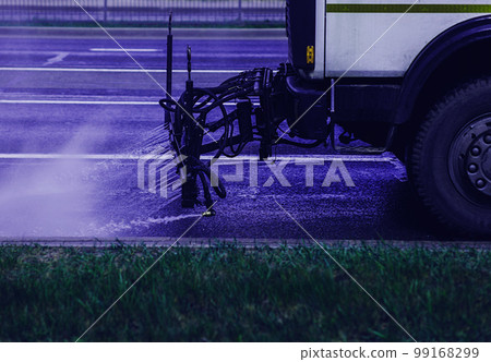 machines washes the city asphalt road machines washes the city asphalt road 99168299