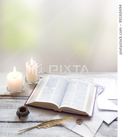 Bible on white wooden table Bible on white wooden table 99168494